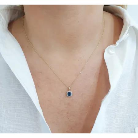 ZŁOTA ZAWIESZKA Z LONDON BLUE TOPAZEM I DIAMENTAMI